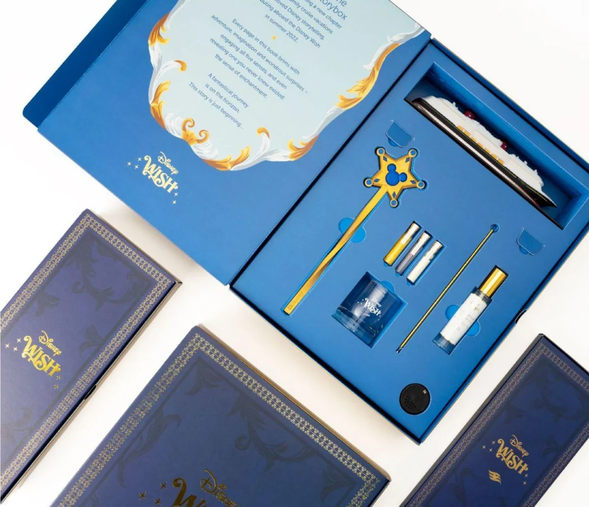 Open Storybox with the model ship, wand, scent, cocktail kit and storybook