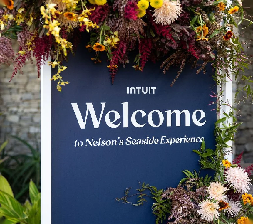 Welcome sign, fruit display, guests and the terrace reception