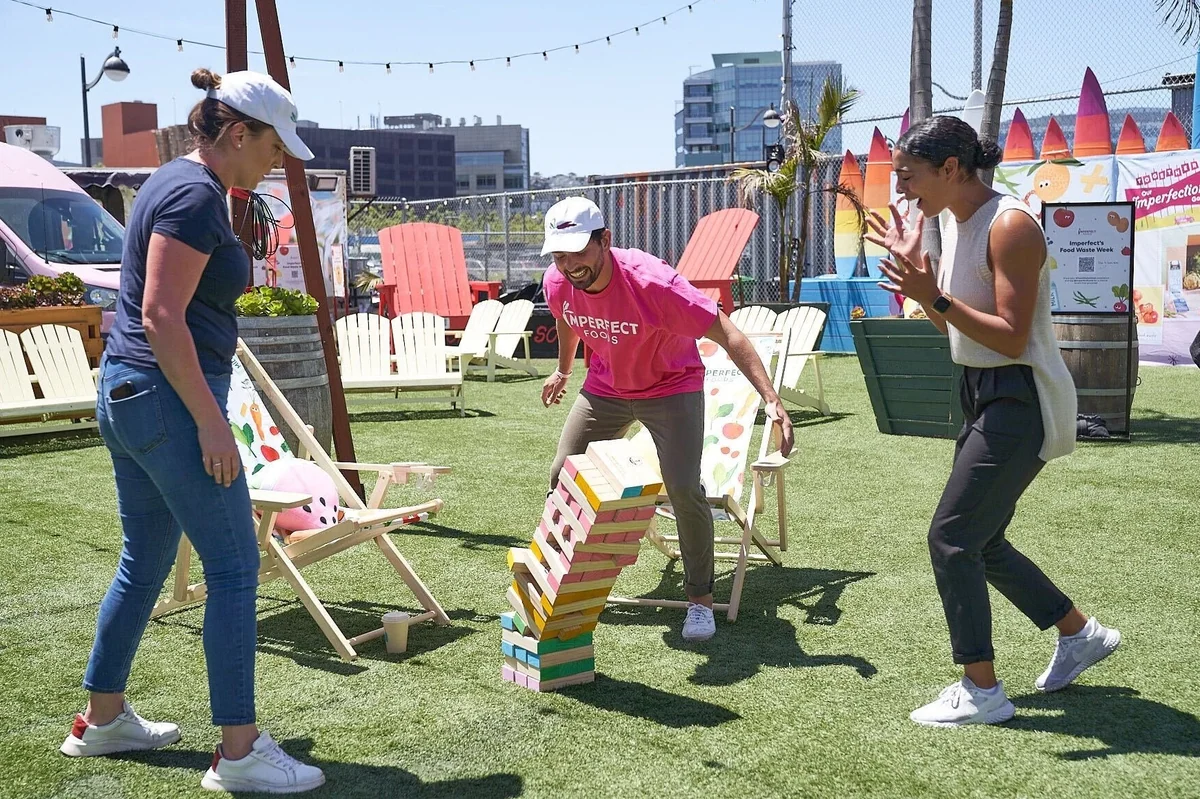 Attendees playing a giant game on the lawn